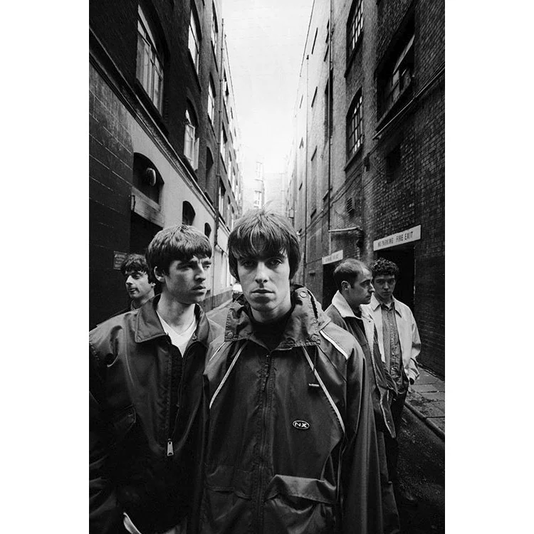Signed limited edition print of Oasis by Kevin Cummins